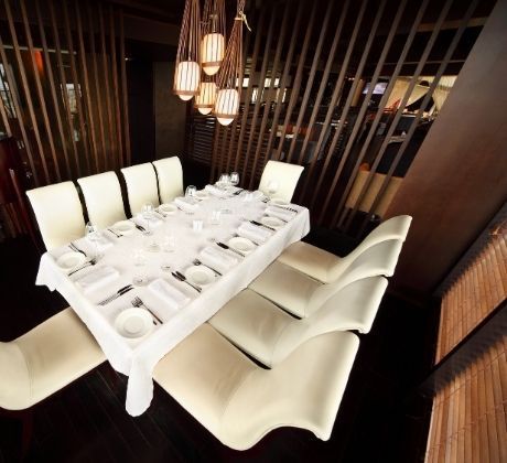 Dining area in a restaurant partitioned with Straton WPC wood finish