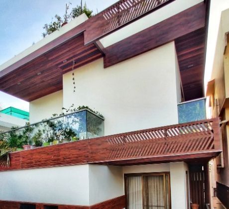 Building facade with ventilation using laser cut High pressure laminate boards