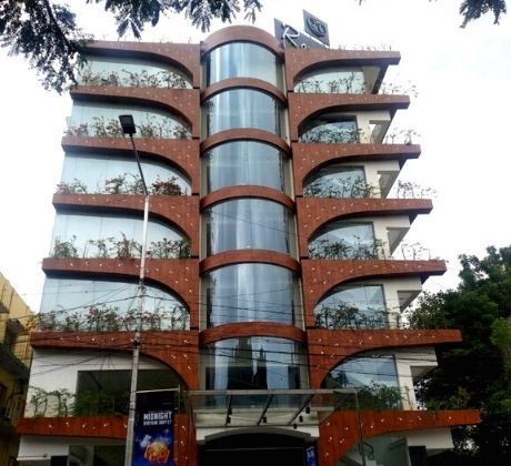 Building facade covered in glass and HPL wall cladding